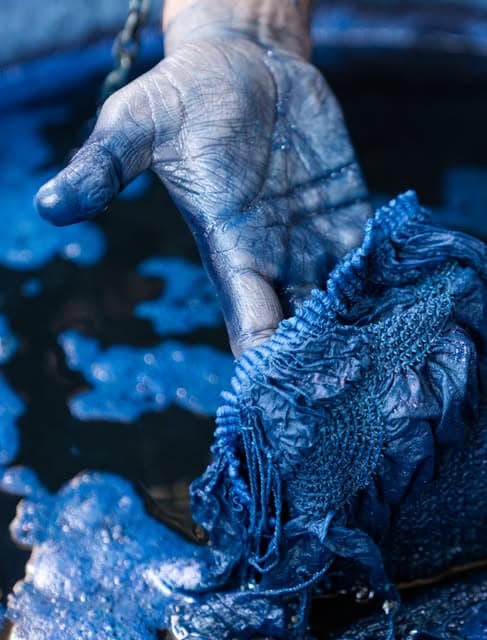 An archival photograph of women making textiles